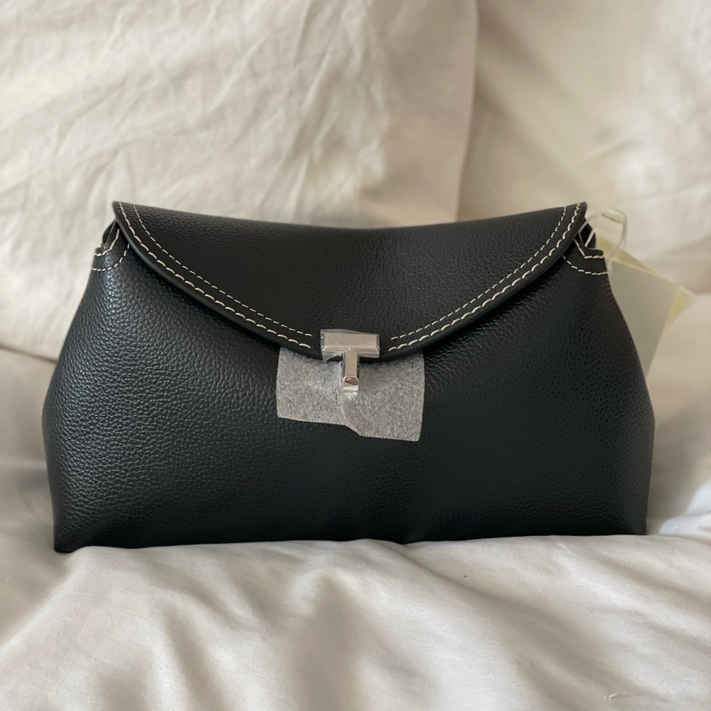Toteme T-Lock clutch black grain